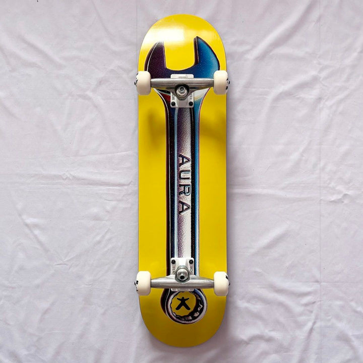 Aura “Yellow Wrench” 8.25” x 32” Custom Skateboard Complete — underside graphic view