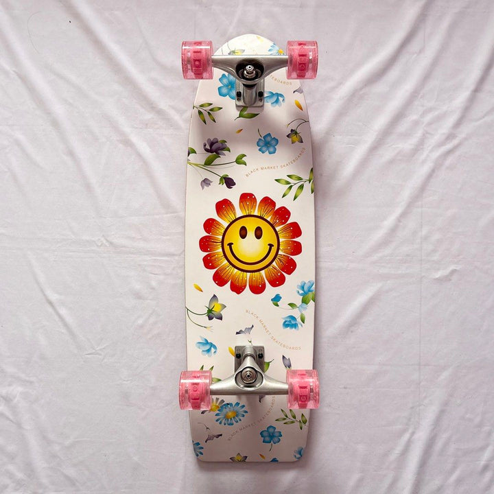 Black Market “Flower” 10” x 32.5” Cruiser Skateboard Complete — underside graphic view