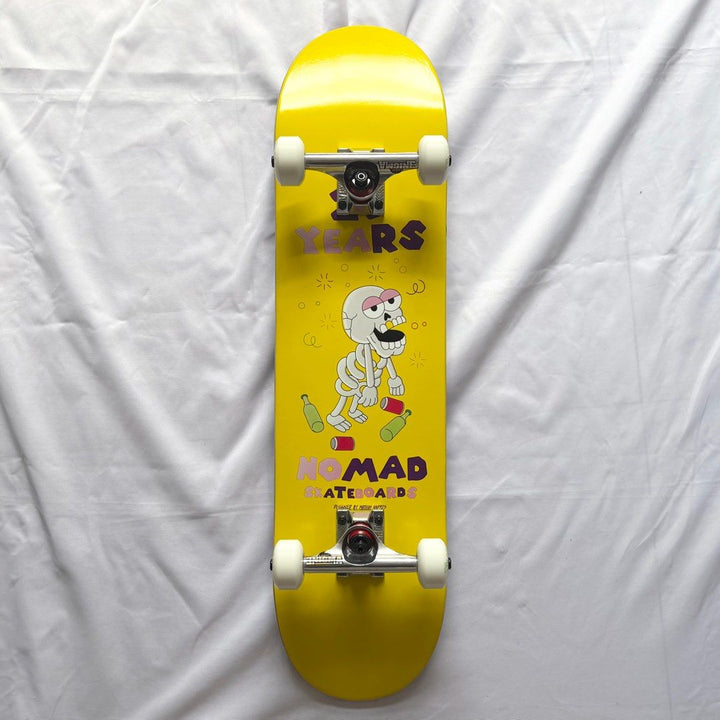 Nomad “Drunk Yellow” 7.875” x 31.5” Custom Skateboard Complete — underside graphic view