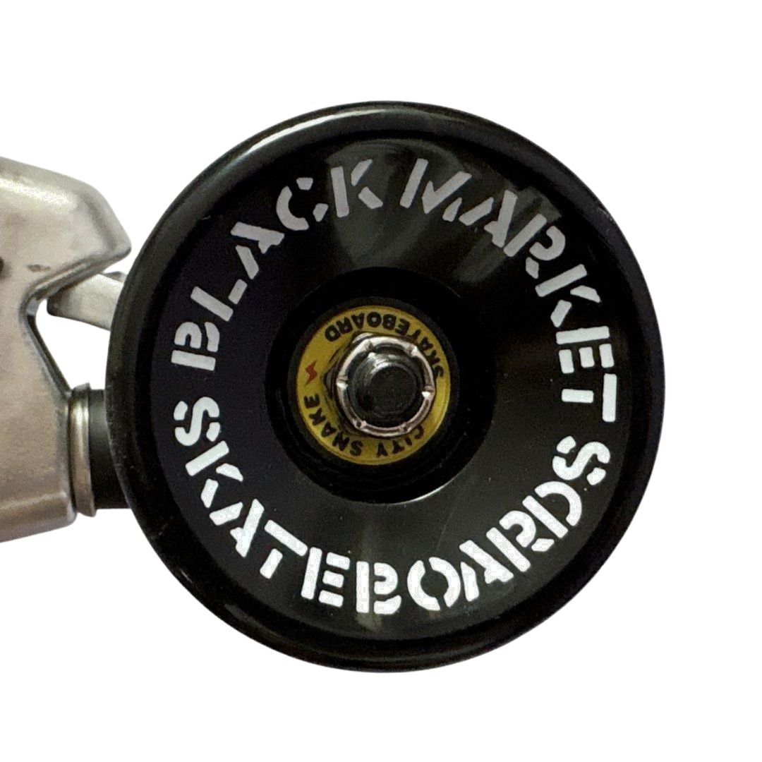 Black Market “Beer” 10.5” x 32” Cruiser Skateboard Complete — wheel close-up