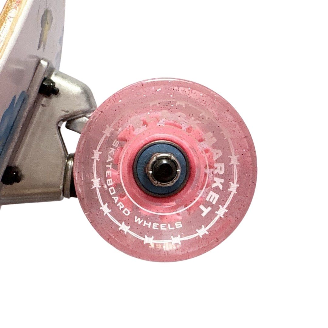 Black Market “Flower” 10” x 32.5” Cruiser Skateboard Complete — wheel close-up