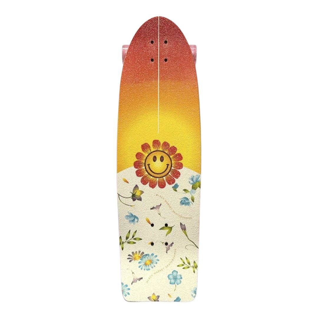 Black Market “Flower” 10” x 32.5” Cruiser Skateboard Complete — grip-tape top view