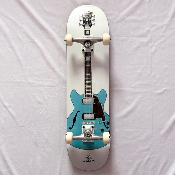 Delta “Guitar” 8.0” x 31.75” Bastien Salabanzi Model Custom Skateboard Complete