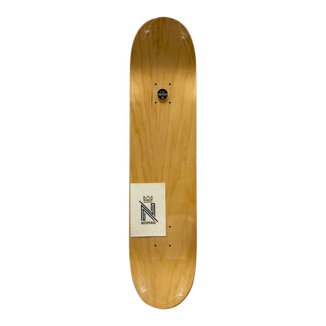 Nomad “Piss” 7.75” Skateboard Deck — top-ply view