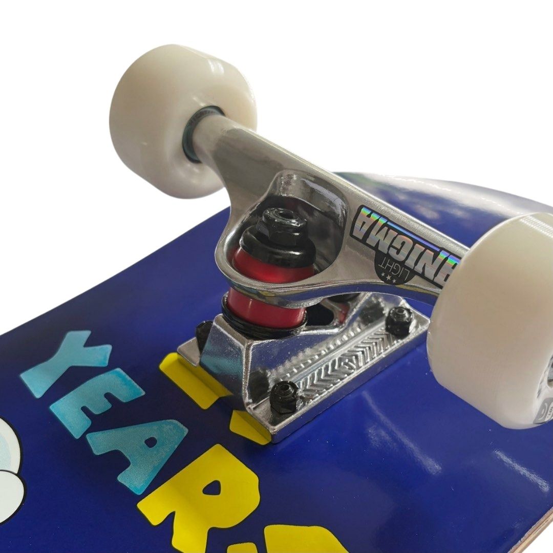Nomad “Piss” 7.875” x 31.25” Custom Skateboard Complete — angled truck detail