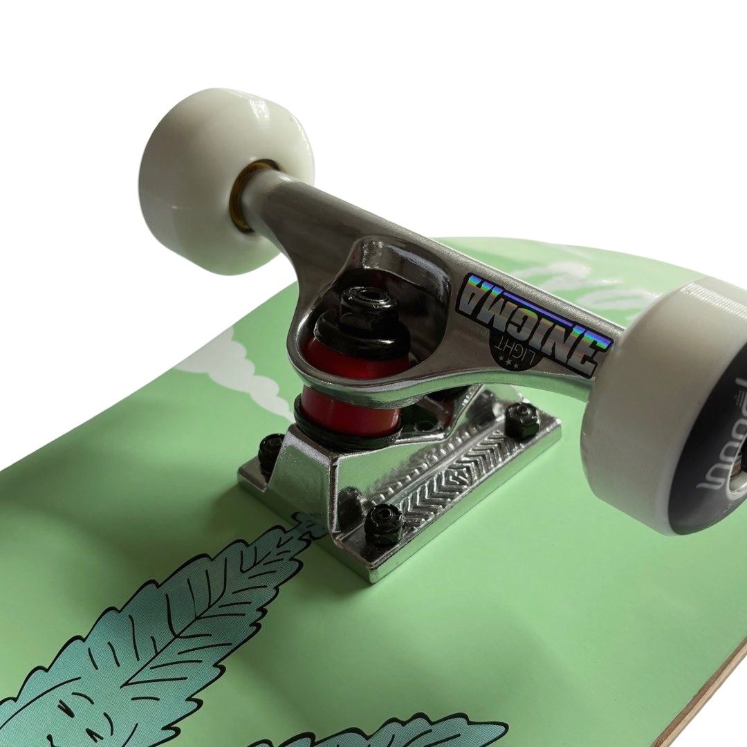 Nomad “See You” 7.875” x 31.25” Custom Skateboard Complete — angled truck detail